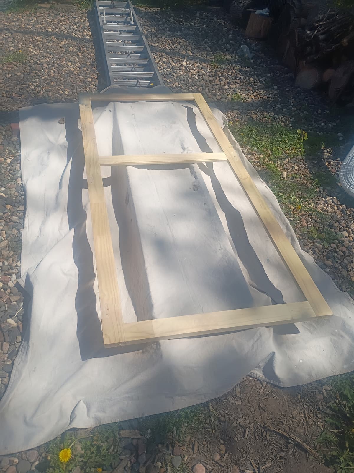 Door frame prep work on drop cloth — Josh's Painting